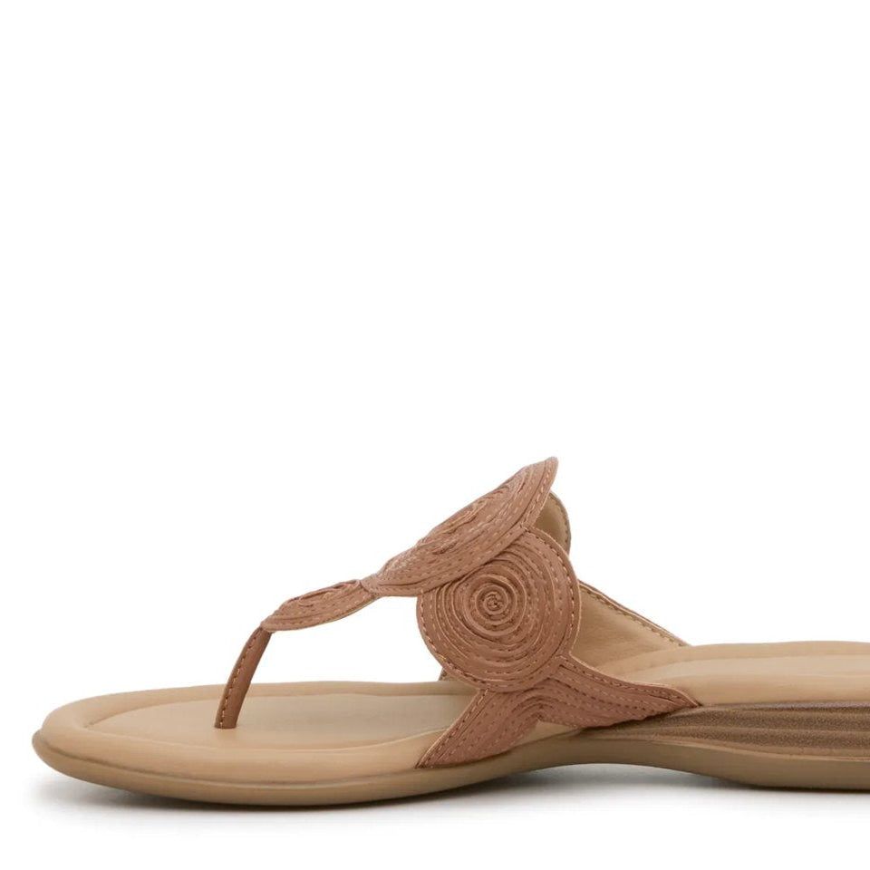 Tan flip flops with decorative stitching